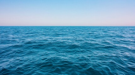 Fototapeta premium Serene Ocean Horizon Wide-angle Blue Seascape with Calm Ripples - Tranquil Summer Seas for Relaxation and Travel Inspiration