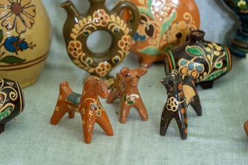 Clay whistle figurines in the shape of horse animals.