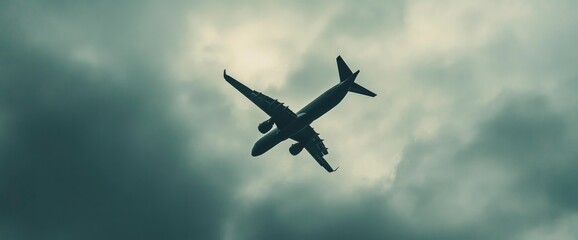 Airplane Silhouette Against Stormy Sky