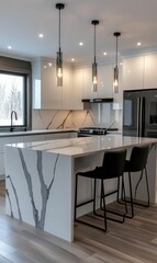 Modern kitchen island with marble countertop.