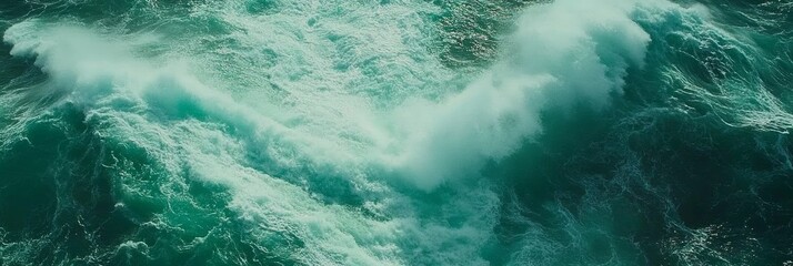 Obraz premium 海の波が青い水面を激しく揺らし、壮大な自然の力を感じさせる瞬間