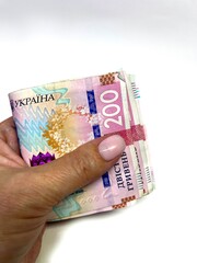 Ukrainian money hryvnia close-up on white background