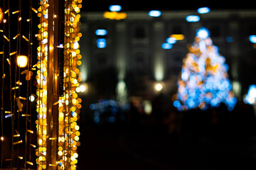 Festive Christmas lights at night on a city street in Hungary