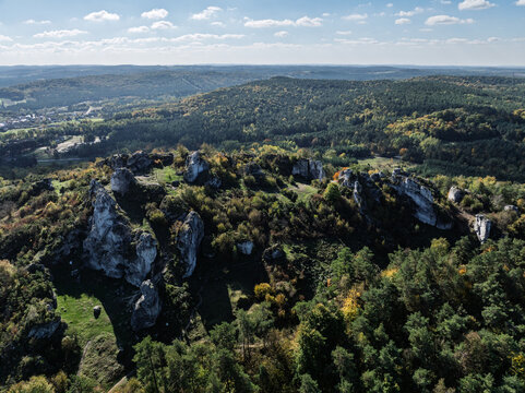Aerial drone view of Zborow Hill, Poland. Limestone rock formation at peak of Gora Zborow, Podlesice, Poland. Krakow-Czestochowa Upland. Polish Jurassic Highland Mountainl Zborow in autumn.