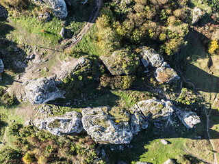 Aerial drone view of Zborow Hill, Poland. Limestone rock formation at peak of Gora Zborow, Podlesice, Poland. Krakow-Czestochowa Upland. Polish Jurassic Highland Mountainl Zborow in autumn.