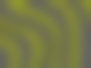 Abstract blurred background with a soft gradient of green and gray.