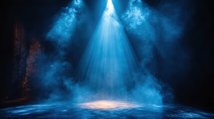 Mysterious blue spotlight illuminating a foggy stage