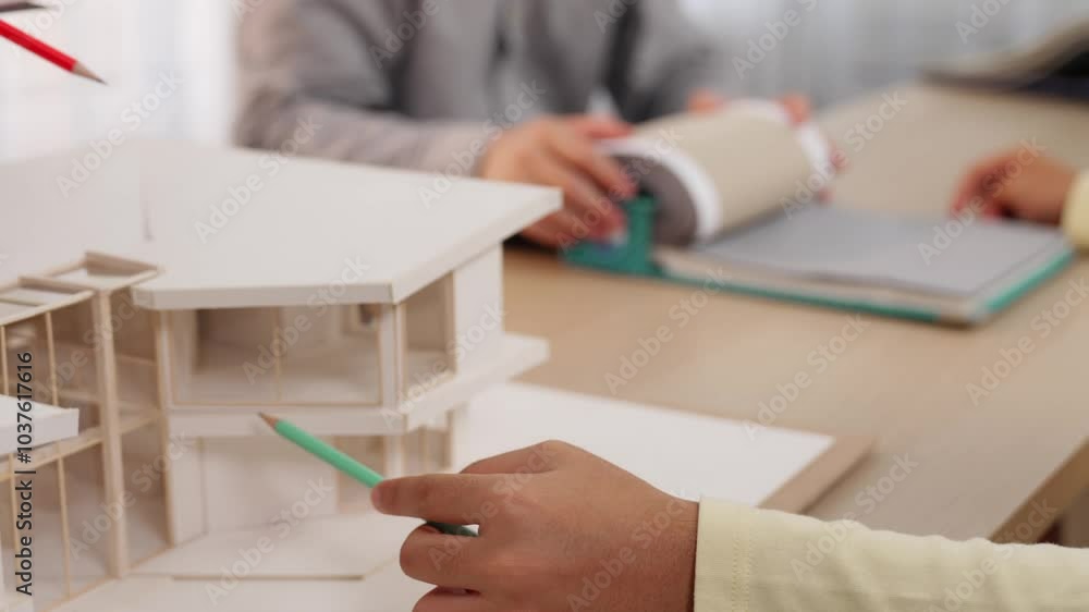 Poster slow motion home designer using architectural equipment draw a blueprint while interior designer sel