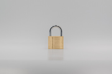 Golden padlock on white background