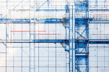Obraz premium A complex grid of blue steel beams and scaffolding arranged in a detailed industrial design with geometric elements 