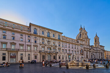 Impressive architecture and fountains filled with tourists around Piazza Novona, Rome, Italy