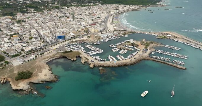 Aerial view of the marina of San Foca in the province of Lecce, Salento, Puglia, Italy. It is a small tourist town on the Adriatic Sea.