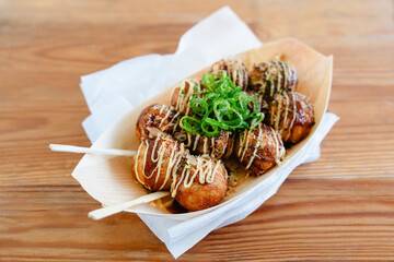 Takoyaki Balls with Octopus Filling and Green Onion Topping