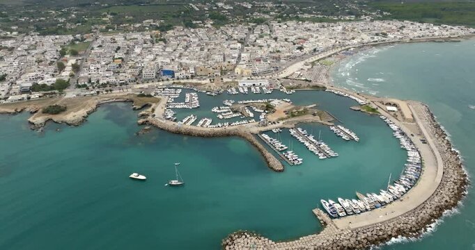 Aerial view of the marina of San Foca in the province of Lecce, Salento, Puglia, Italy. It is a small tourist town on the Adriatic Sea.