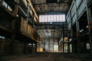 Large abandoned industrial hall interior