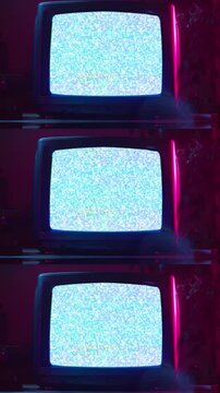 vertical multiple green screen (chroma key) old retro CRT TV monitor with RGB glitch animation, abstract zoom-out motion overlay
