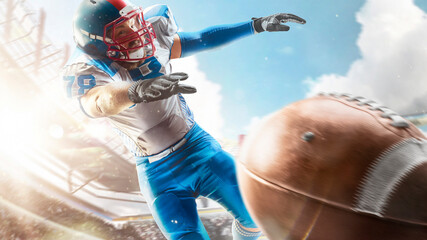 American football player catches the ball and flies in the air. Sports arena with fans. Bright sun. Sportsman in action. Isolated on white background