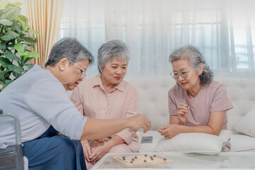 Fototapeta premium A group of elderly individuals attentively listen to a healthcare professional in a cozy room. The scene emphasizes senior care, health consultations, and supportive communication in a relaxed.