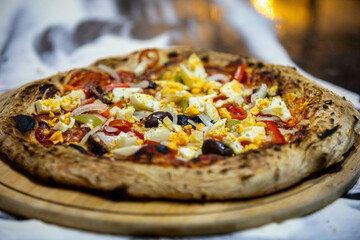 Authentic Portuguese pizza prepared with classic ingredients. Vera pizza 