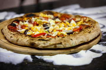 Authentic Portuguese pizza prepared with classic ingredients. Vera pizza 