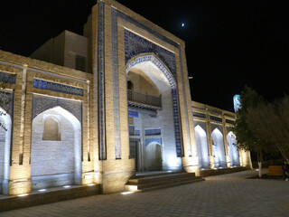 Ornate islamic architecture shining under the night sky