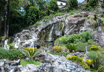 waterfall in exotic garden setting at Basilica de Guadalupe in Mexico