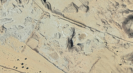 The landscape of the sandy desert in Qatar from a bird's eye view