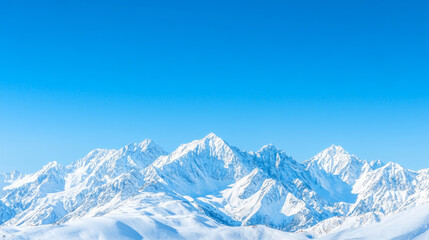 Snow capped mountains under clear blue sky create stunning winter landscape. serene beauty evokes sense of tranquility and wonder.