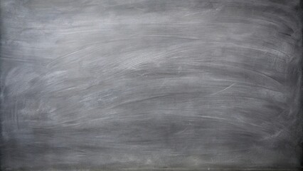 Close-up of chalk smudged on gray chalkboard background texture