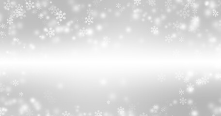 Blurred glitter effects background. Bright soft blue with hints of pearl color. Christmas background. Festive Christmas backdrop with holiday charm. Blurred bokeh light on dark blue background.