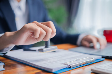 Man carefully reviewed finance agreements and contract documents with his client, discussing loan, mortgage, investment opportunities, credit terms, and tax implications for their business.