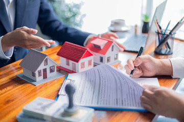 Businessperson decided to buy new home, securing loan to finance property and obtaining insurance...