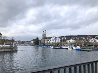 Obraz premium Small city in Austria. On a bridge overlooking the river to a church