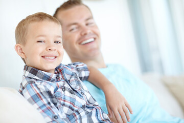 Thinking, father and child relaxing at house for safety, bonding together and love of relationship care. Happy, man and son for calm morning, weekend break and family support of embrace at apartment