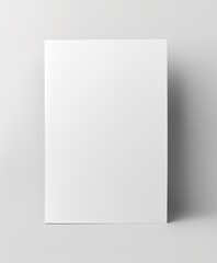 Fototapeta premium A single closed paperback book, plain cover, minimalist design, isolated on white background 