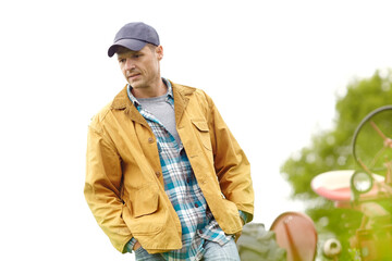 Tractor, farm and man checking plants with care, agro industry or small business owner at harvest. Agriculture, sustainability and farmer with outdoor inspection, thinking and truck in countryside