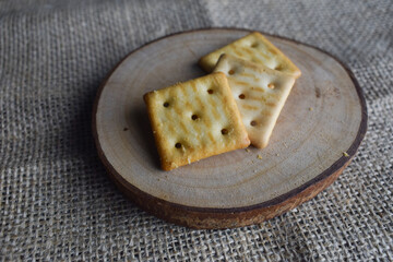 Biscuit snacks on wooden cutting board