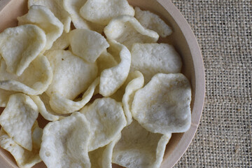 Snack crackers in a wooden bowl
