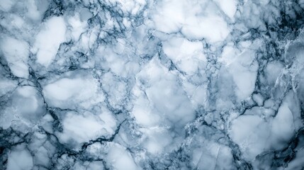 Abstract blue marble texture with intricate patterns and a smooth appearance.
