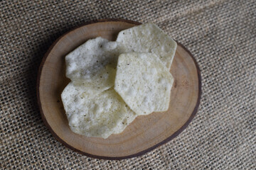 Potato chips on wood chips