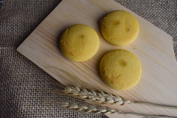 Nextar biscuits with pineapple flavor on a wooden cutting board