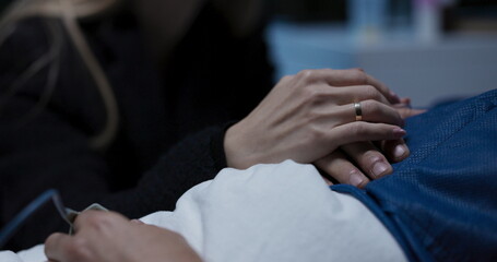 Obraz premium Close-up of hands, showing support and care.