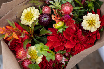 Colorful flower bouquets for sale at a farmers market stand