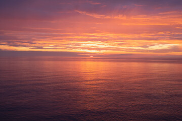 Obraz premium Colorful sunset over sea from Hoy, Orkney, Scotland