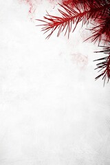  A pine tree branch against a white backdrop, dotted with red paint splatters