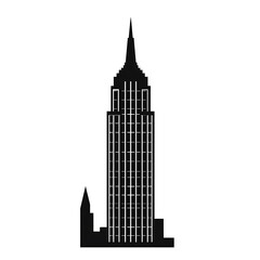 Fototapeta premium A silhouette of a tall skyscraper with a pointed roof and multiple windows.