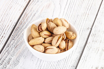 Salted tasty pistachio nuts heap