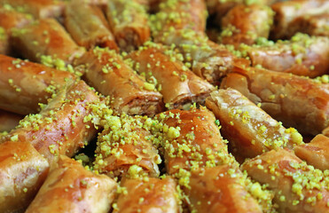 Closeup of Delectable Baklava Pastries Topped with Chopped Pistachio Nuts