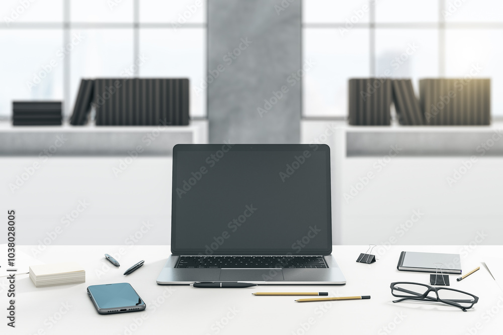 Poster Front view on modern laptop with blank dark screen with copyspace for your logo or text on light table with smartphone, glasses and office tools on blurred office background. 3D rendering, mockup