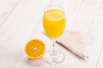 Sweet fresh orange juice in the glass